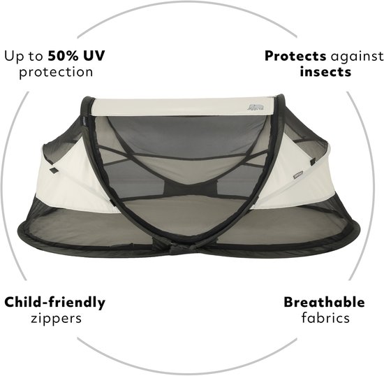 Deryan Baby Luxe campingbedje in crème en zwart, met tekst over UV-bescherming, insectenwering en kindvriendelijke ritsen.