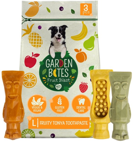 Gele, groene en oranje hondensnacks in de vorm van tiki's, met een verpakking met vruchtenmotief en een bordercollie.