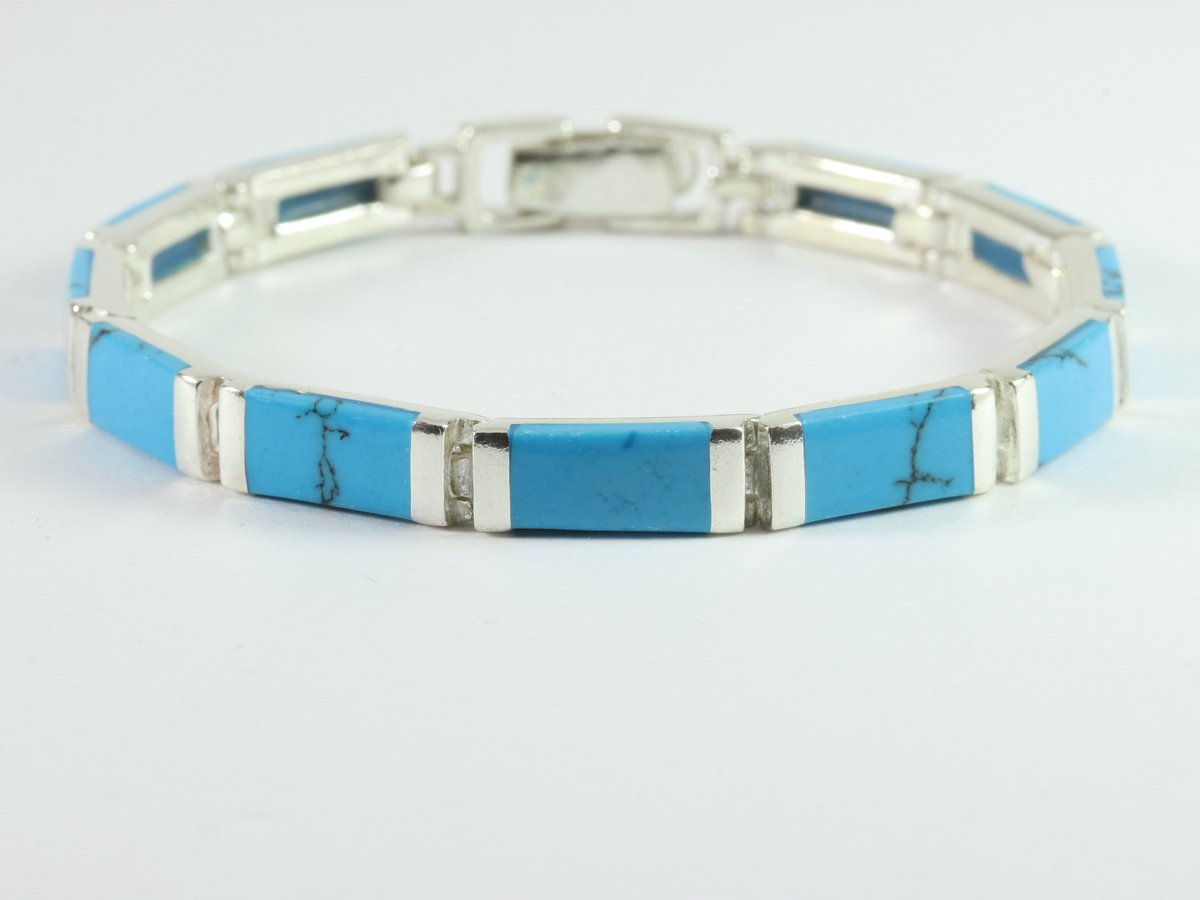 Zilveren schakelarmband met blauwe turkoois