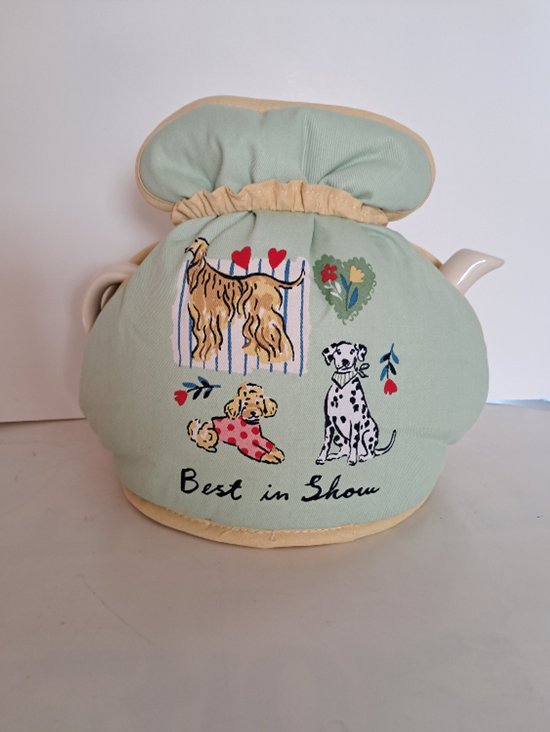 Theemuts 'Best in Show' met afbeeldingen van een Afghaanse windhond, poedel en dalmatiër op een lichtgroene achtergrond met gele bies.
