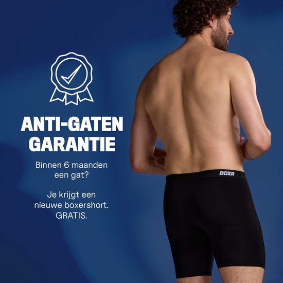 Man draagt zwarte BOXR boxershort. Garantie tegen gaten binnen 6 maanden, met een tekstballon met een vinkje.