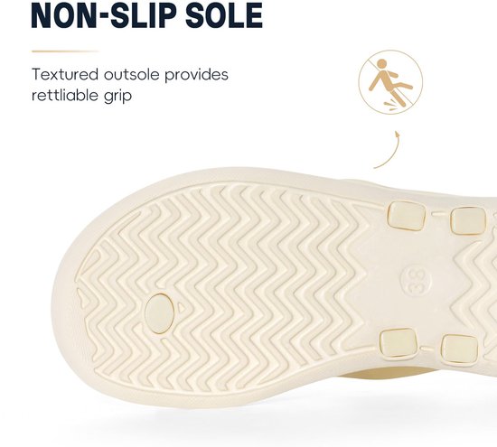 Detail van de beige teenslipperzool met antislip textuur.