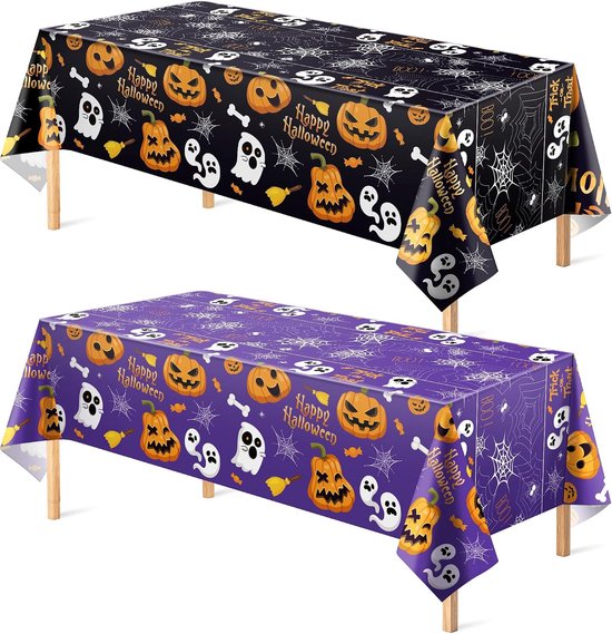 Twee Halloween tafelkleden, een zwarte en een paarse, beide met pompoenen, spoken, spinnenwebben en 'Happy Halloween' tekst.