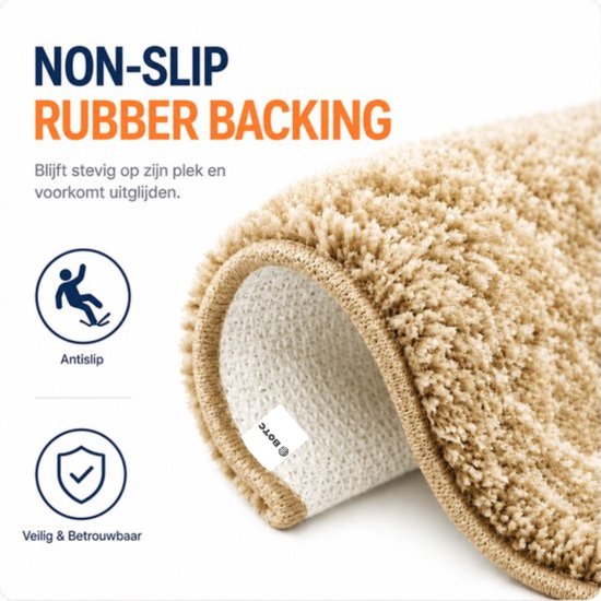 Zicht op een beige badmat met de tekst 'Non-Slip Rubber Backing'. Antislip en veilig.