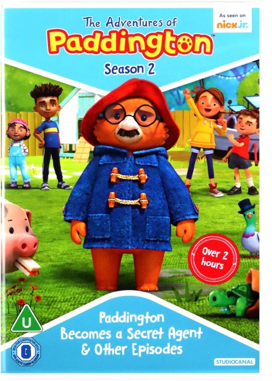 Paddington met blauwe jas en rode hoed, omringd door personages uit de serie.