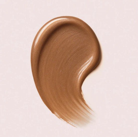 Een veeg glanzende bronskleurige gel nagellak met gouden ondertonen.
