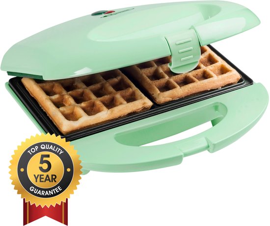 Lichtgroen wafelijzer met twee bruine wafels en een 'Top Quality 5 Year Guarantee' sticker.