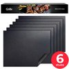Zes zwarte Grillx BBQ Grill Mats met een patroon van kleine puntjes, in de verpakking.