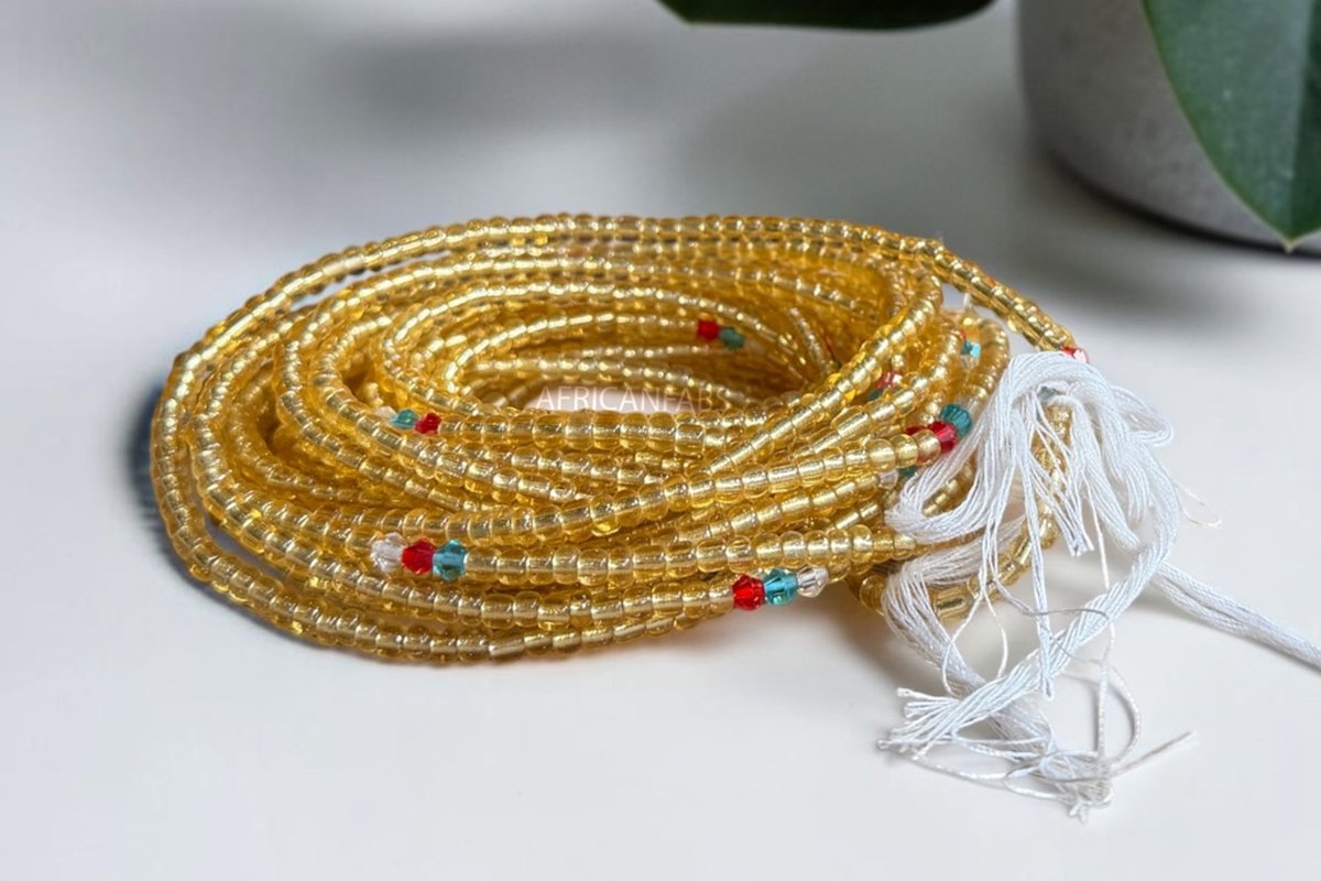 AfricanFabs® Waist Beads / Afrikaanse Heupketting - Binbo - Goud (Traditioneel niet-elastisch koord) - Buikketting - Taille ketting
