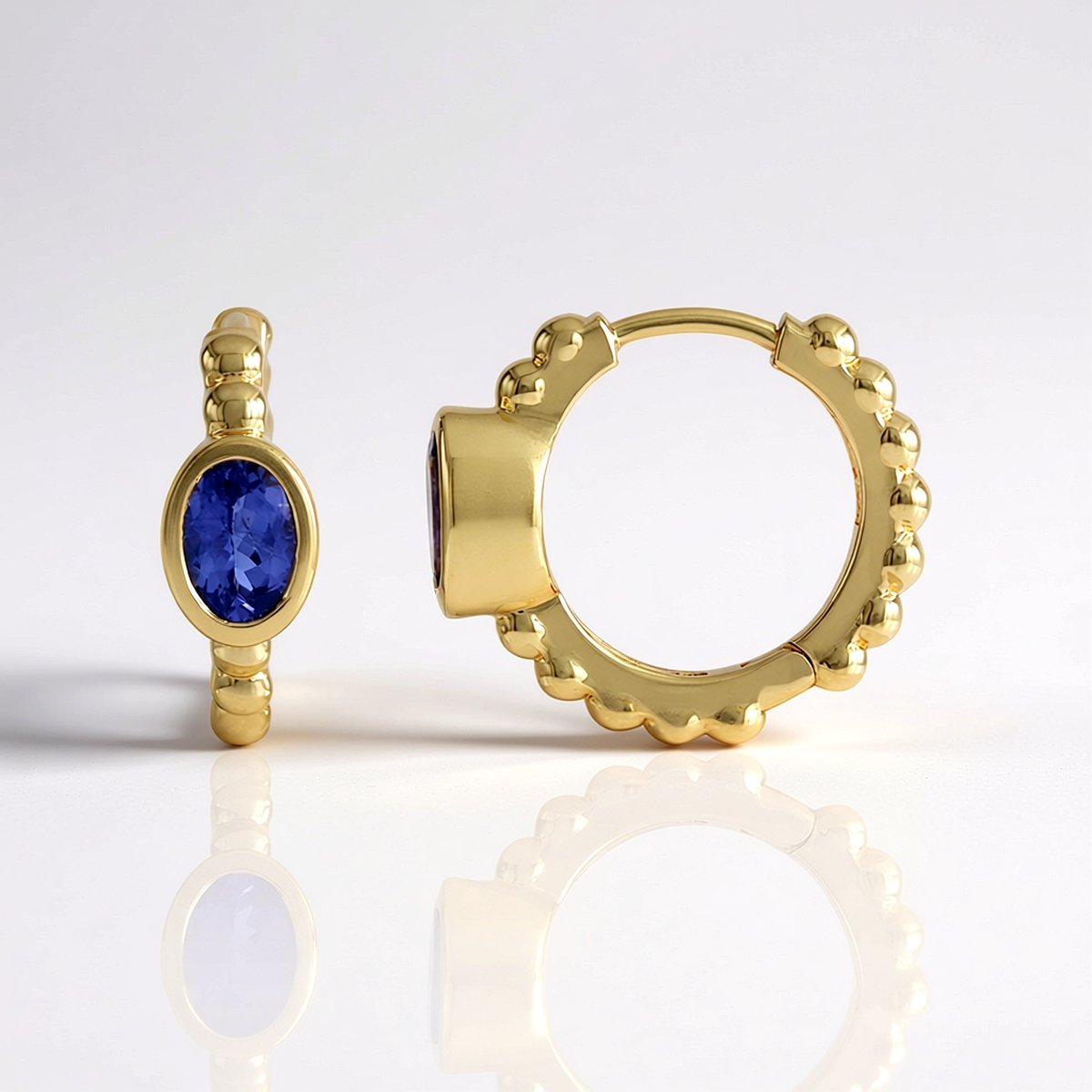 Cavill - Zilveren oorbellen met vergulde laag - 1,165 ct ovale Tanzaniet - 925 Sterling Zilver - Elegante blauwe edelsteen - Luxe dames sieraden