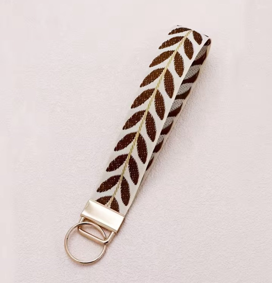 Telefoonkoord voor om je pols - Telefoonkoord - Band voor telefoon - Accessoire voor telefoon - Accessoire voor smartphones - Accessoire voor Iphone - Polsband - Armband voor telefoon - Phone cord - Goud - Wit - Bruin - Gewoon Leuk!