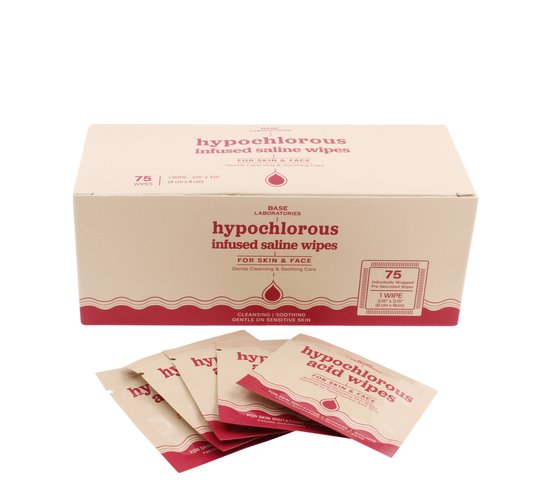 Een doos met 75 individueel verpakte hypo-chloorzuur doekjes voor huid en gezicht, met rode en beige verpakking.