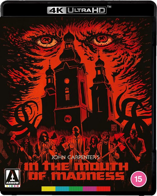 4K Ultra HD Steelbook 'In the Mouth of Madness'. Rode achtergrond met groot oog, kerk, tentakels en groep mensen met bijlen. Titel en leeftijd 15.