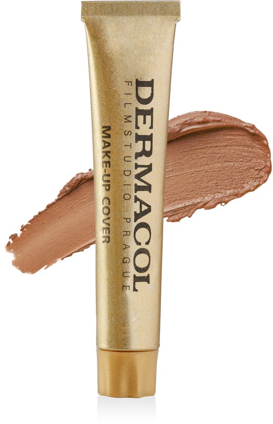 Een gouden tube Dermacol make-up cover foundation met een veeg bruine foundation ernaast.