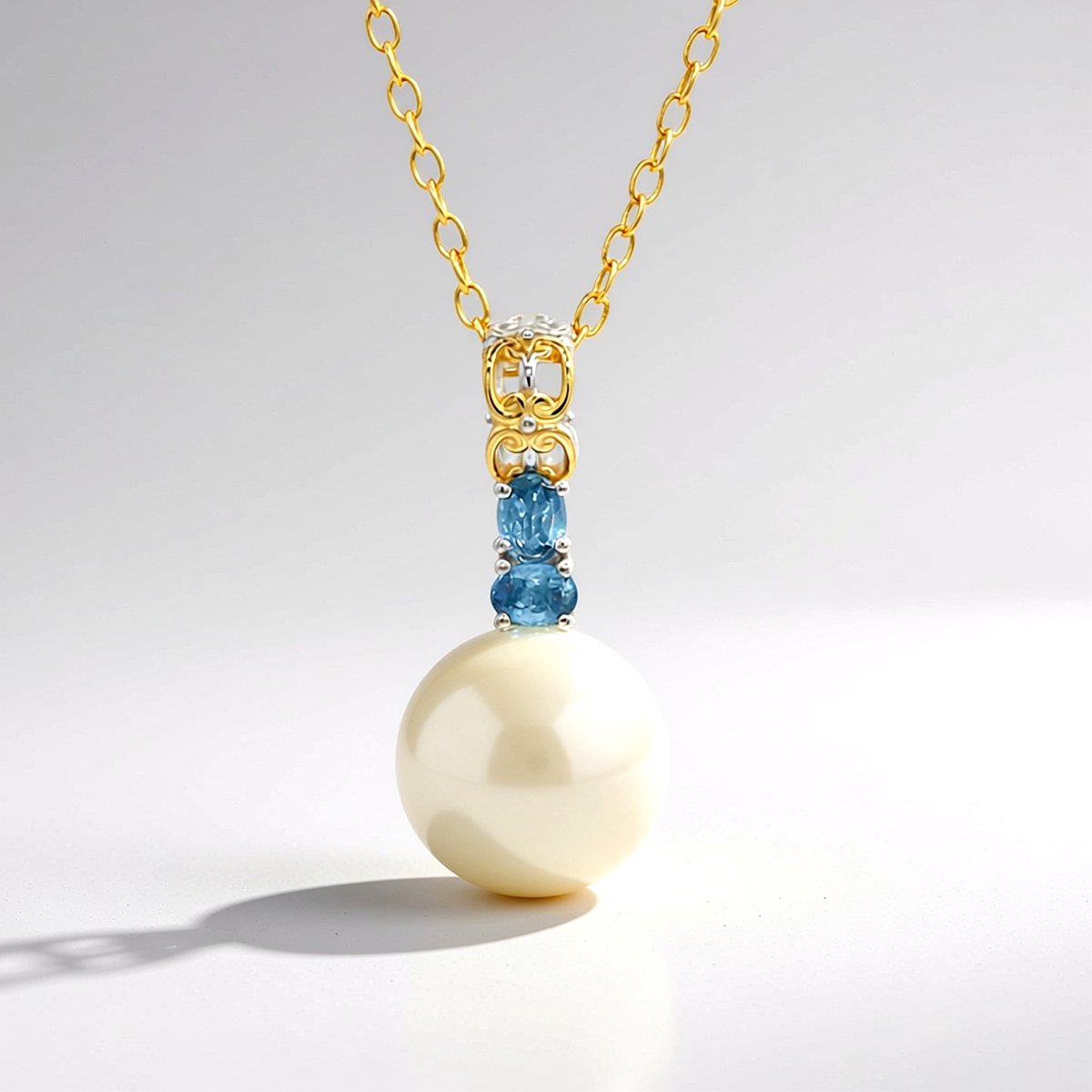 Cavill - Elegante verstelbare halsketting - 925 Sterling Zilver verguld - Witte 12mm Zoetwaterparel - 0,45 ct Blauwe Saffier ovaal