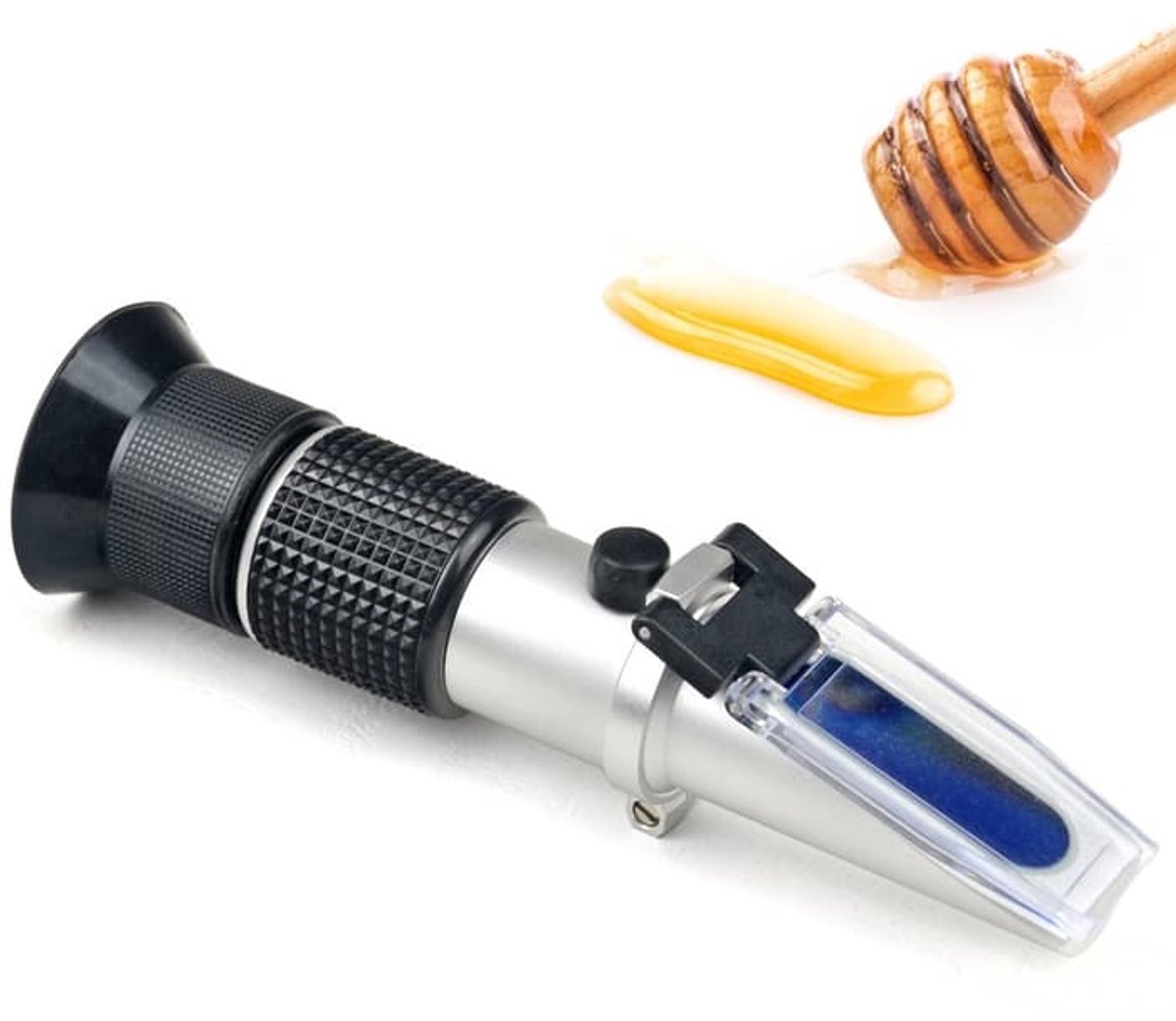 Een refractometer voor het meten van het vochtgehalte, het Brix-gehalte en de Baumé-waarde van honing; een drie-in-één apparaat; het Brix-meetbereik is 58-90%; geschikt voor honing, ahornsiroop en melasse.
