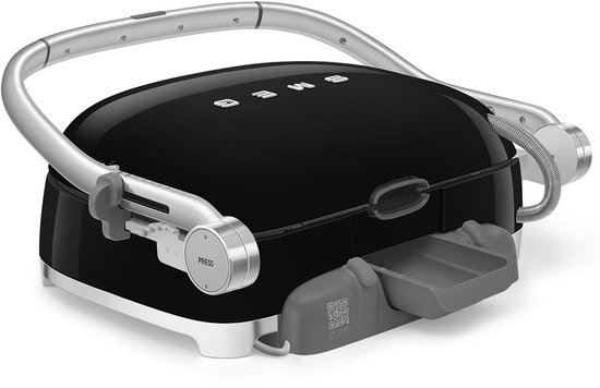 Zwarte contactgrill, gesloten, met chromen handgreep en uitneembare lekbak.