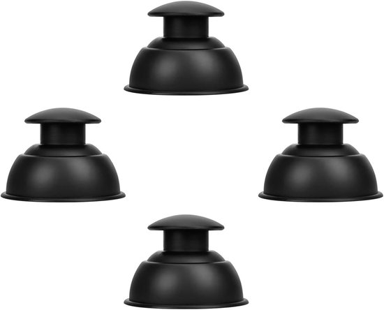 Vier zwarte siliconen cupping-bekers op een witte achtergrond.