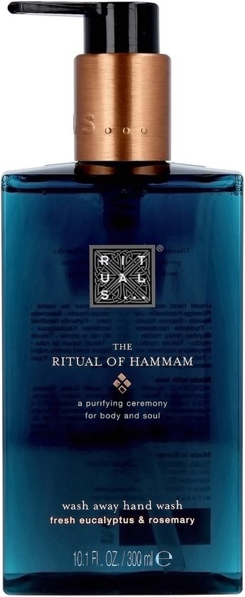 Donkerblauwe flacon met koperkleurige pomp, "The Ritual of Hammam" handzeep, een zuiveringsceremonie voor lichaam en ziel, frisse eucalyptus en rozemarijn.