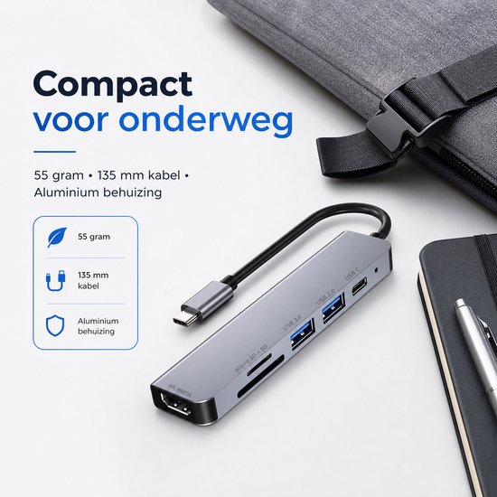 Grijze 6-in-1 USB-C hub met HDMI, 2x USB 3.0, SD/Micro SD-kaartsleuven, 55 gram, 135mm kabel, aluminium behuizing.