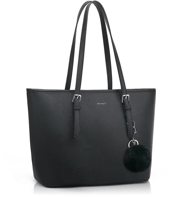 Zwarte shopper handtas met verstelbare gespen op de handvatten en een zwarte fluffy sleutelhanger.