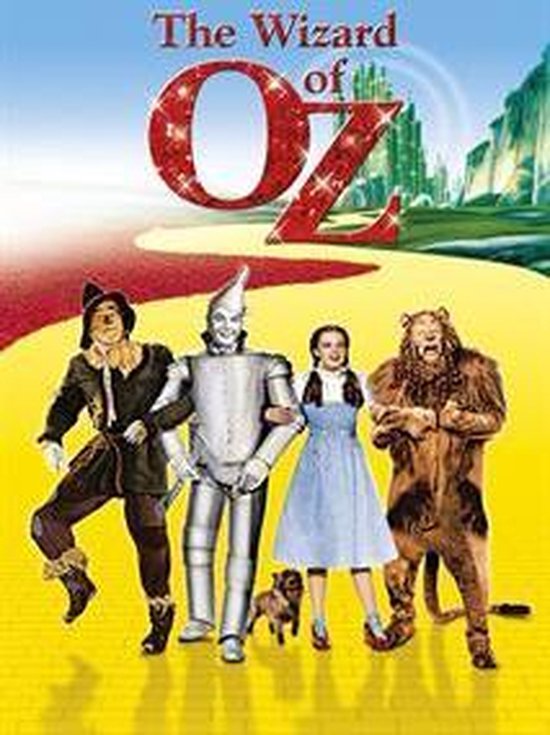 De Scarecrow, Tin Man, Dorothy met Toto en de Lion lopen op de gele stenen weg in The Wizard of Oz.