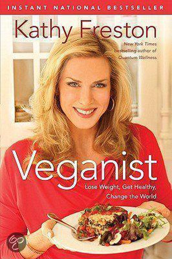 Boek "Veganist" met een vrouw in rode top die een bord met veganistisch eten vasthoudt. "Kathy Freston" en ondertitel "Lose Weight, Get Healthy, Change the World".