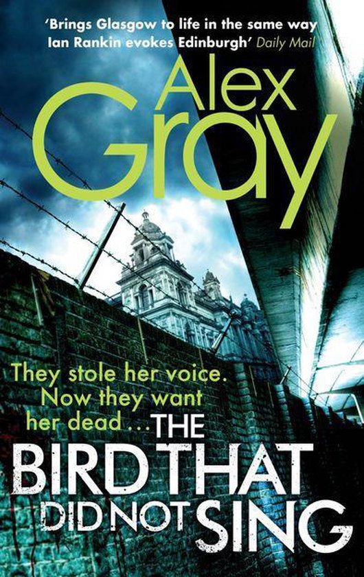 Boekomslag van "The Bird That Did Not Sing" door Alex Gray. Met de titel en auteursnaam in grote letters, en een foto van een gebouw met prikkeldraad op de voorgrond.