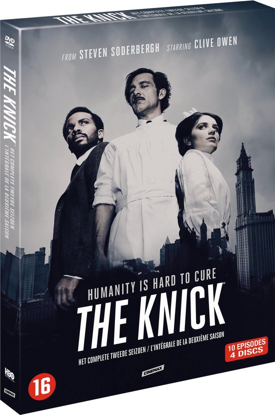 Dvd-hoes van The Knick, seizoen 2, met drie personen voor een stadsgezicht. 'HET COMPLETE TWEEDE SEIZOEN'.