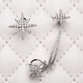 Fashionidea – Mooie asymmetrische oorbellen zilverkleurige sterren met strass steentjes