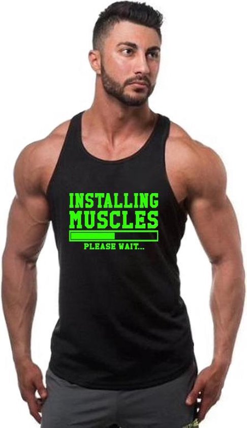 Chemise de sport débardeur noire taille L avec texte vert "Installing Muscles"