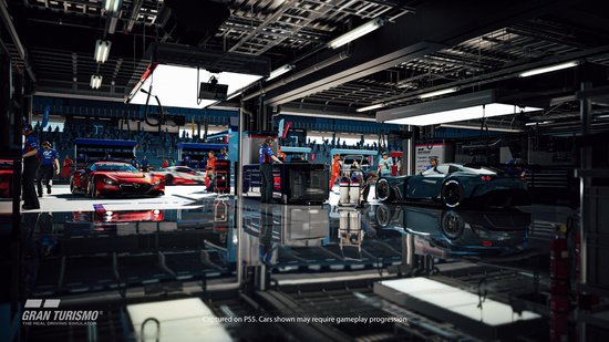 Een garage met meerdere sportwagens, inclusief rode en blauwe modellen.