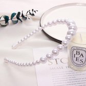 Leuke diadeem met grote en klein witte parels