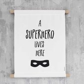 Textielposter "a superhero lives here".