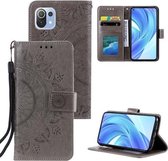 voor xiaomi mi 11 lite totem bloem reliëf horizontale flip tpu + pu lederen tas met houder en kaartsleuven en portemonnee (grijs)