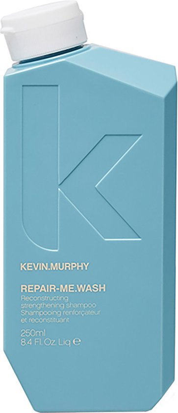 Bouteille KEVIN.MURPHY bleu pâle avec bouchon blanc. "REPAIR-ME.WASH" est inscrit dessus.