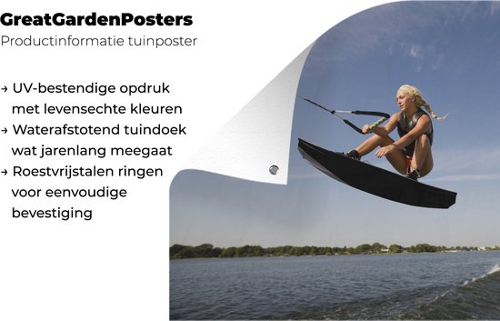 Une femme sportive s'agenouille sur un poster de jardin wakeboard 180x120 cm - Toile de jardin / Toile d'extérieur / Peintures d'extérieur (décoration de jardin) XXL / Groot format!
