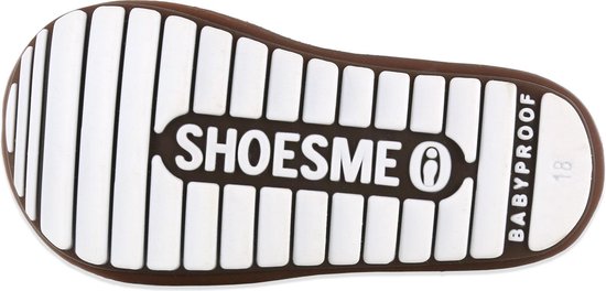 Zool van witte babysneaker met "SHOESME BABYPROOF" inscriptie.