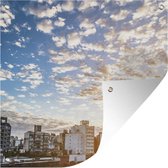 Tuindoek Verschillende wolkenvelden boven de hoogbouw in Rosario - 100x100 cm