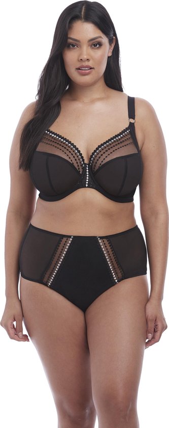 Model draagt een zwarte bh en een bijpassende hoge slip met doorschijnende zijkanten.