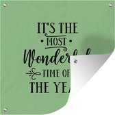 Tuinposters Kerst quote "It's the most wonderful time of the year" tegen een groene achtergrond - 50x50 cm - Tuindoek - Buitenposter