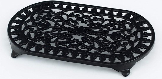 Sous-plat ovale en fonte noire avec un motif floral ornemental et des pieds.