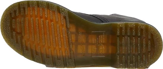 La semelle transparente et jaune à coussin d'air d'une botte Dr. Martens.