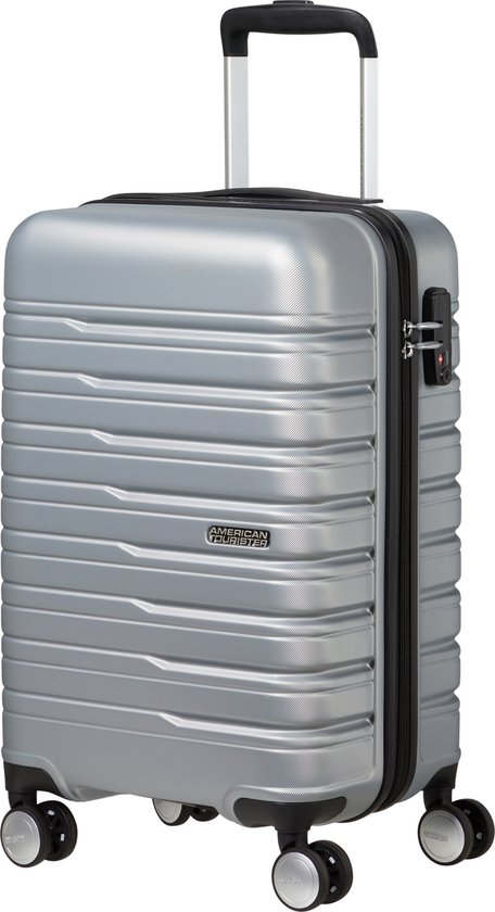 Zilveren spinner koffer met uitschuifbaar handvat, TSA-slot en 'AMERICAN TOURISTER' logo.