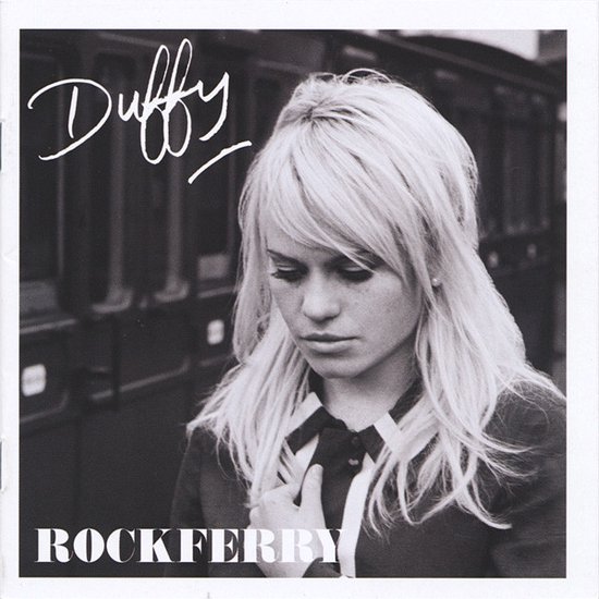 Portret van zangeres Duffy met blonde haren, met het album "Rockferry" en haar naam.