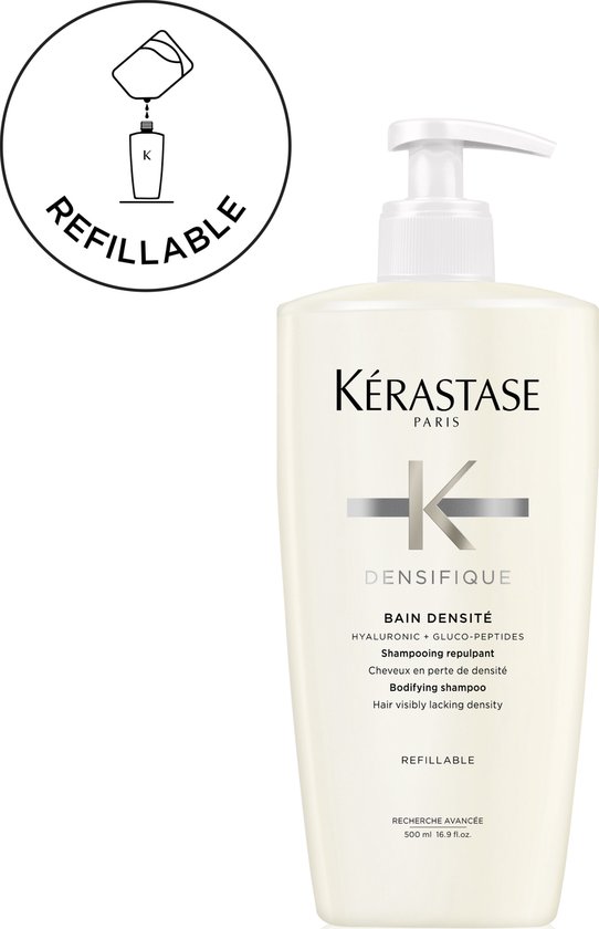 Kérastase Densifique Bain Densité shampoo in een witte navulbare fles met pompje. Cirkelvormig icoon: 'REFILLABLE'.