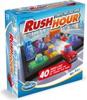 Doos van het spel Rush Hour met een verkeersopstopping en gekleurde auto's op een spelbord.