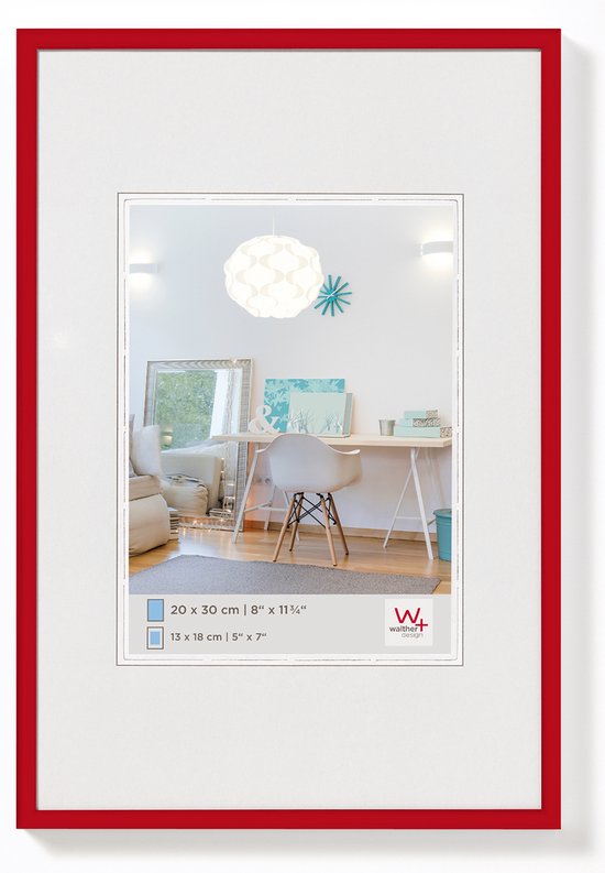 Cadre rouge en plastique avec passe-partout blanc, montre un intérieur avec un bureau.