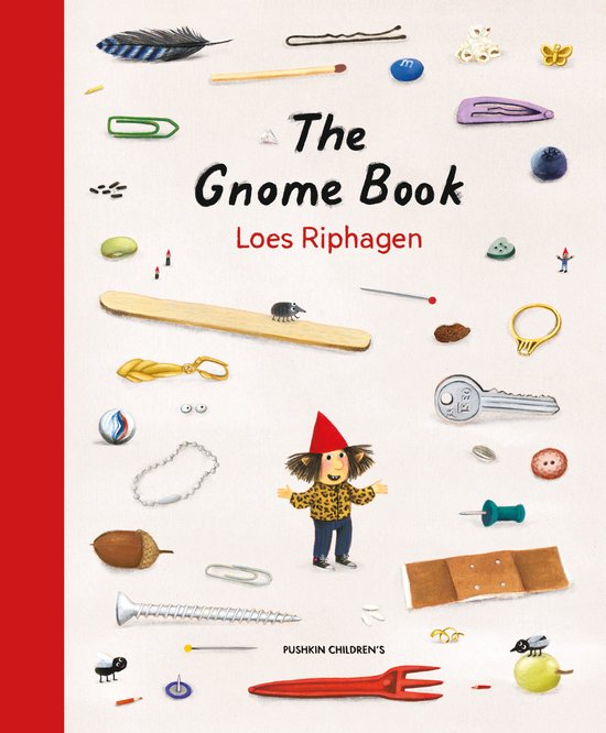 De omslag van 'The Gnome Book' toont een kleine, vrolijke gnome met rode puntmuts en bontjas, omringd door diverse kleine voorwerpen zoals een veer, lucifer, paperclips, en een sleutel.