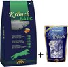 Donkere zak met Kronch BASIC hondensnack, met visafbeelding en lopende hond. Naast een zakje lakse kronch met zalm.